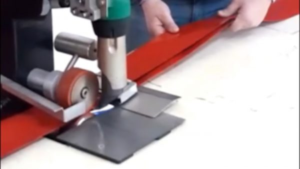 Soldadura de refuerzos y dobladillos en lonas de camión con la HEMTEK ST de Leister para acabados rápidos y consistentes en Picariello Teloni