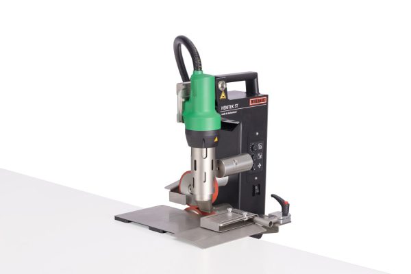 Máquina estacionaria Leister HEMTEK ST para soldadura y acabado de lonas de PVC